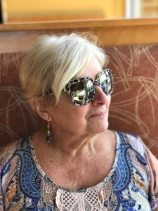 fashionable senior woman wearing sunglasses